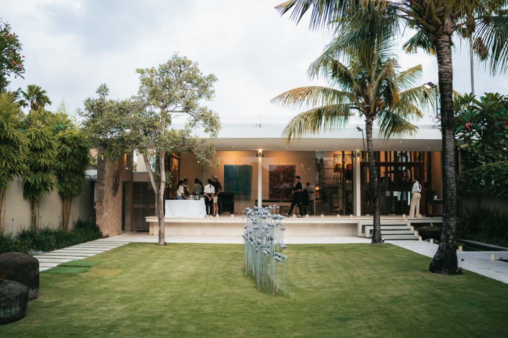 Guests gathering at Kendra Art Space during a private evening event in Seminyak.
