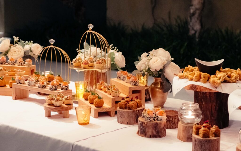 Elegant canapé and dessert spread arranged for a catered private event