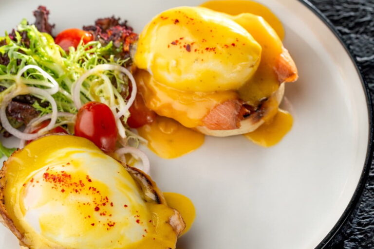 Kilo's Perfect Pair of Eggs Benedict brunch dish at Kilo Seminyak