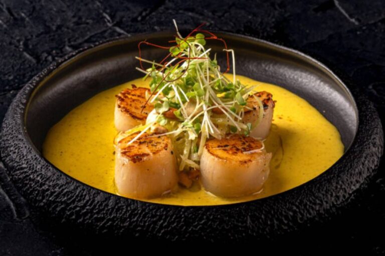 Perfectly Seared Scallop gourmet seafood appetizer at Kilo Seminyak
