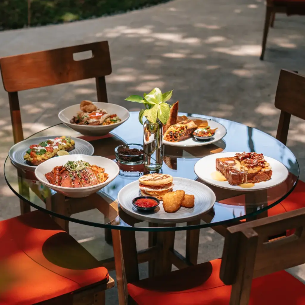 A full table spread of Kilo Kitchen's all-day breakfast menu dishes in Seminyak