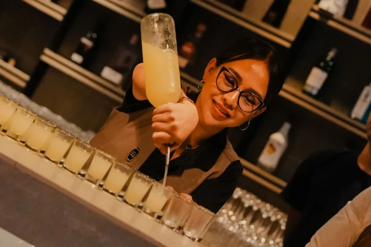 Preparing Grass Thought by Shot cocktail at Kilo Kitchen Bali bar, Seminyak