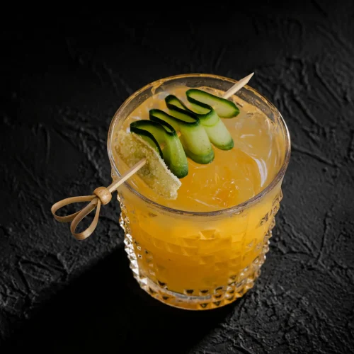 Kilo's Mule cocktail with cucumber garnish, Kilo Kitchen Bali Due Course pairing