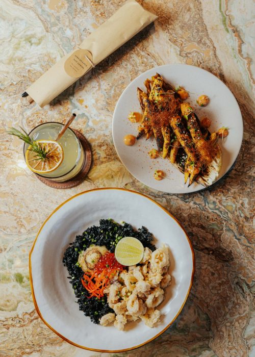 Squid Ink Rice served on the table with other menus at Kilo